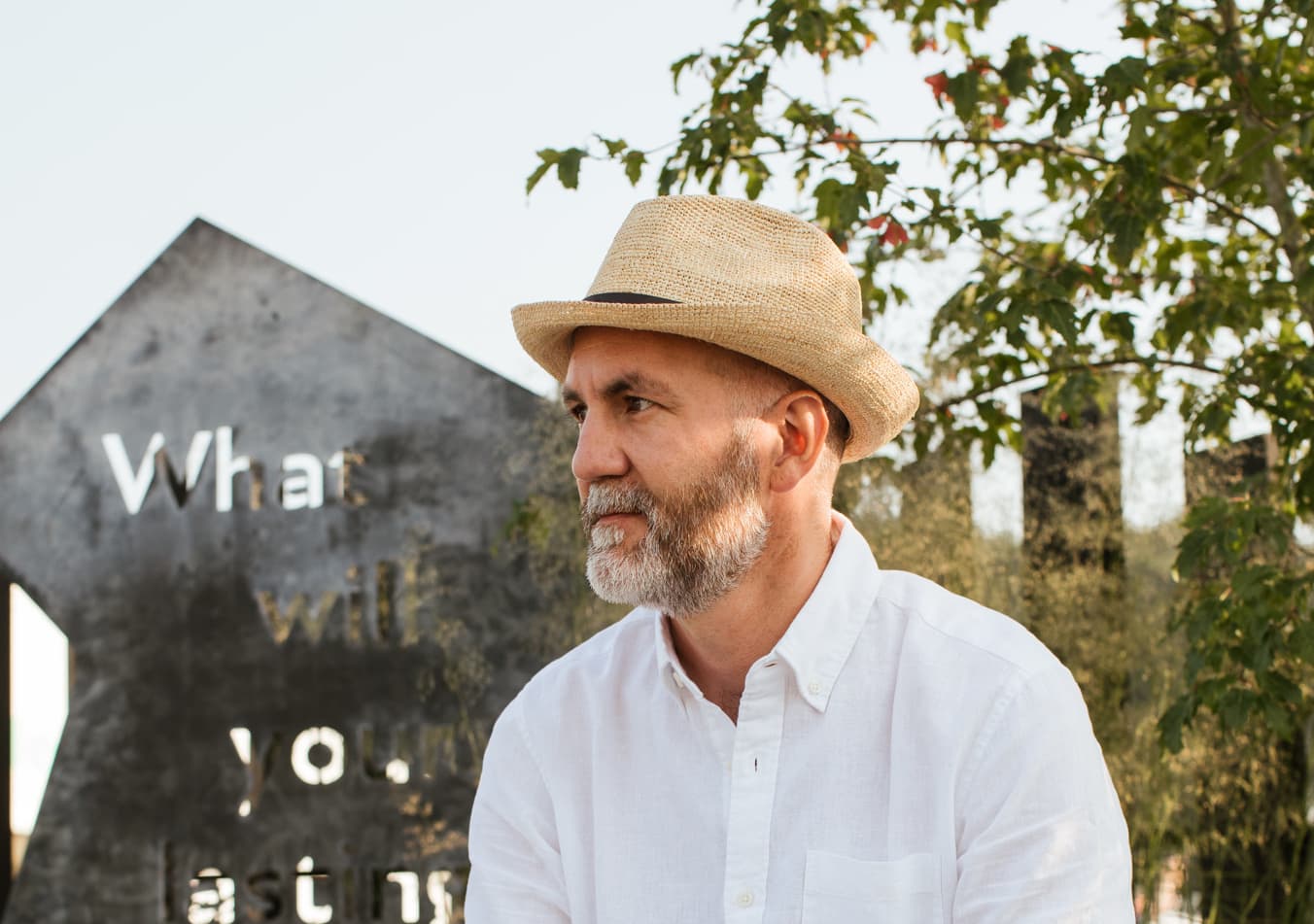 Rob Hardy headshot taken in a garden