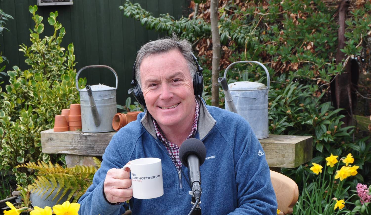 Martin Fish ready for recording outside with a mug