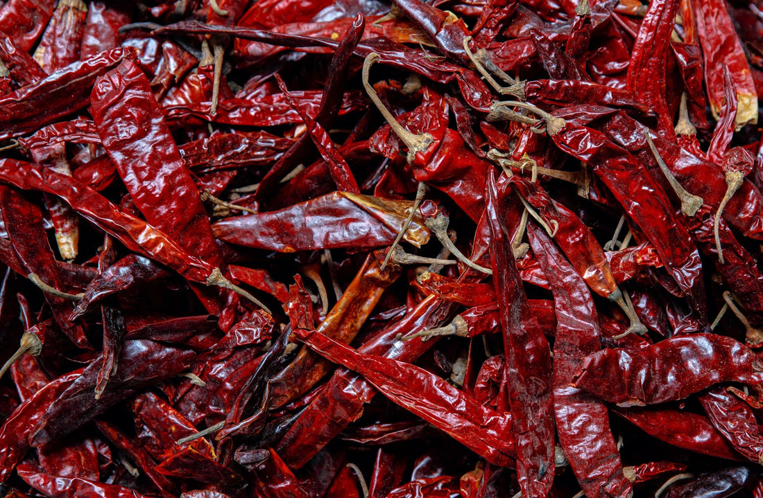 a mass of dried red chilli peppers