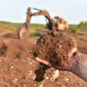 compost being harvested from peatland bog