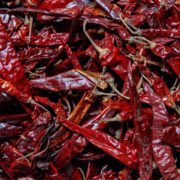 a mass of dried red chilli peppers