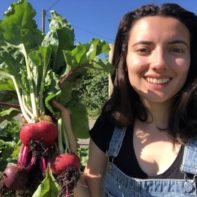 Emily with garden harvested beetroot