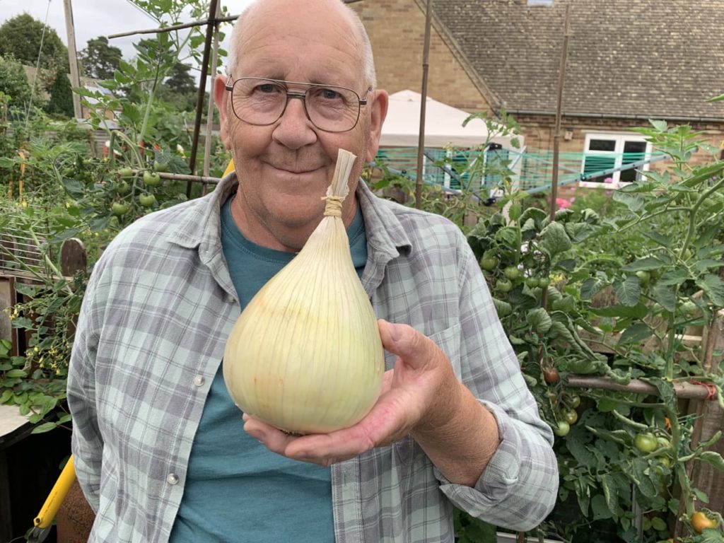 Gerald Stratford with one of his large onions