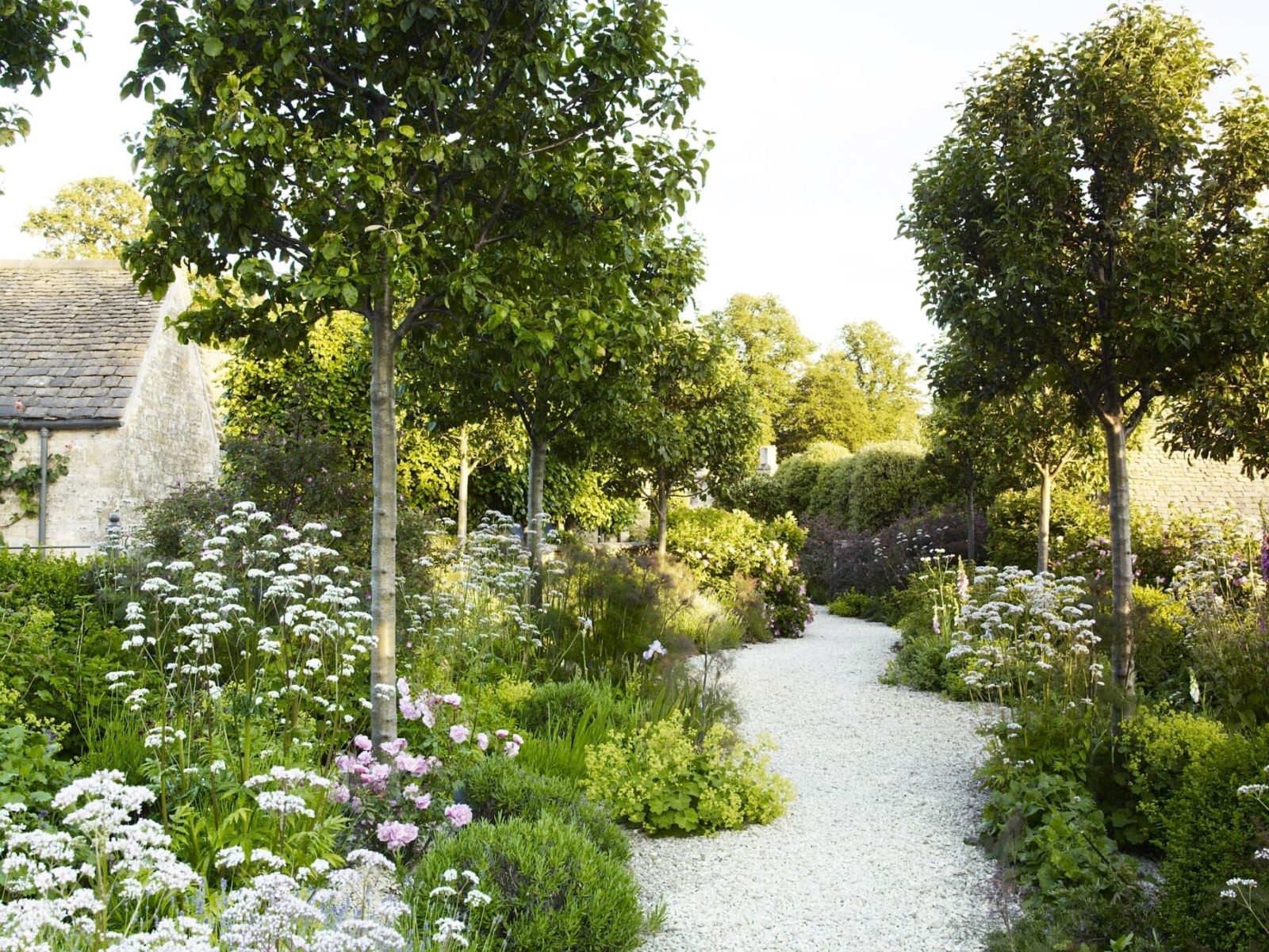 Jinny Blom's design of a large garden with a clear pathway down the centre