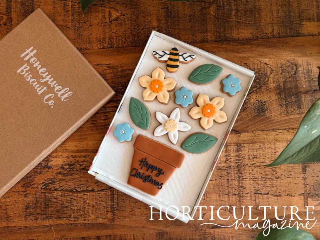 Honeywell bakes biscuits that are personalised with a Christmas message and shaped like flowers and bees