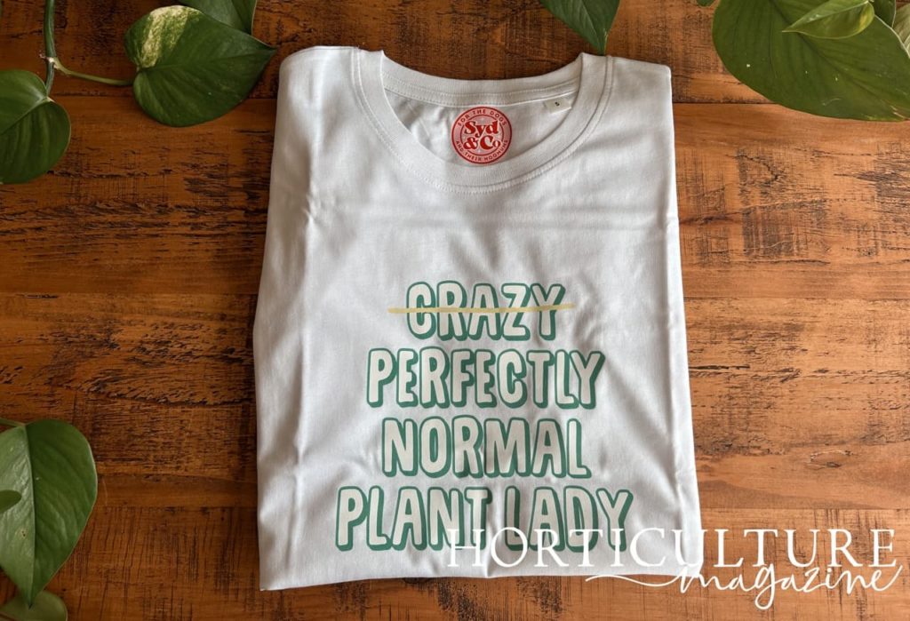 'crazy perfectly normal plant lady' text printed onto a white t-shirt