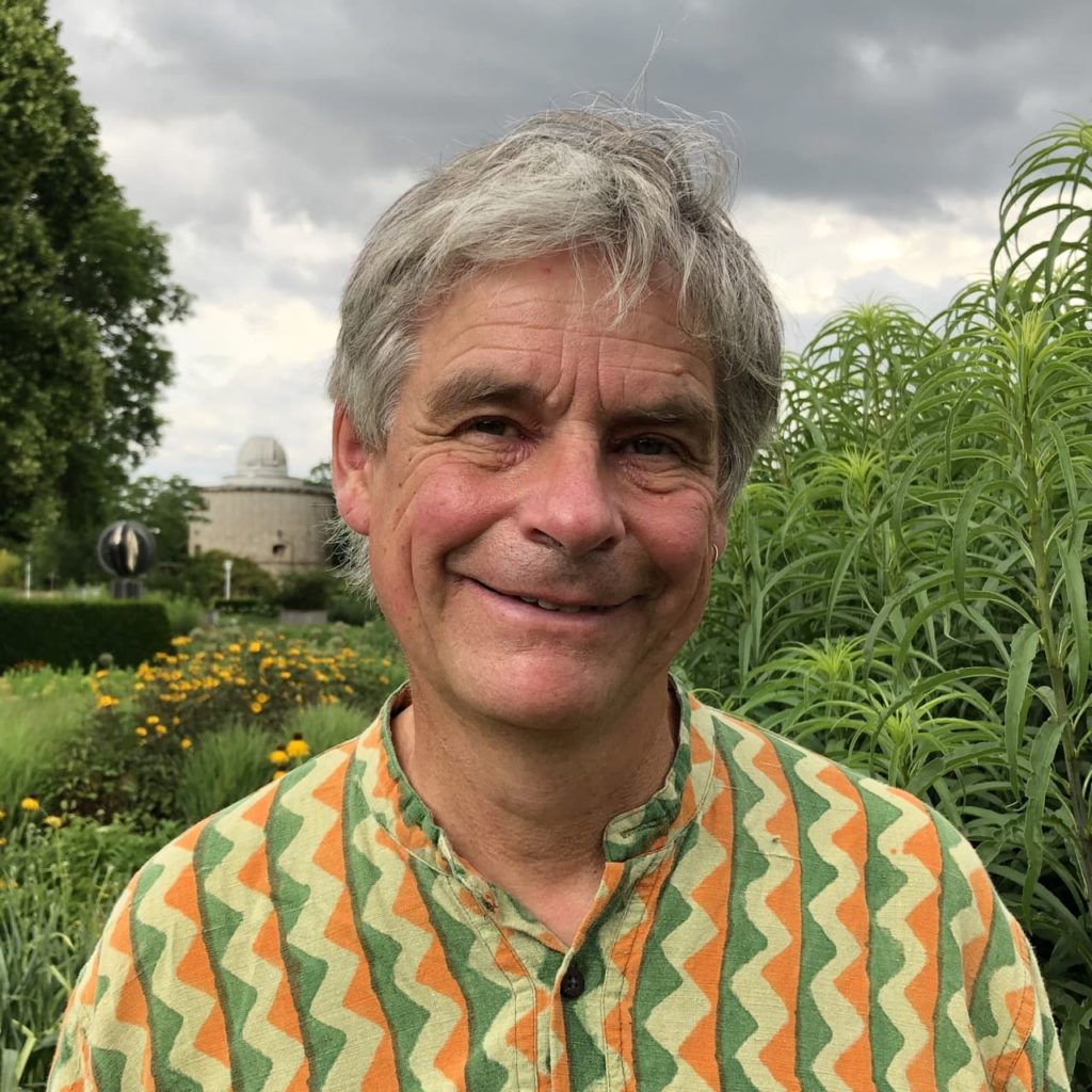Noel Kingsbury in his garden outside