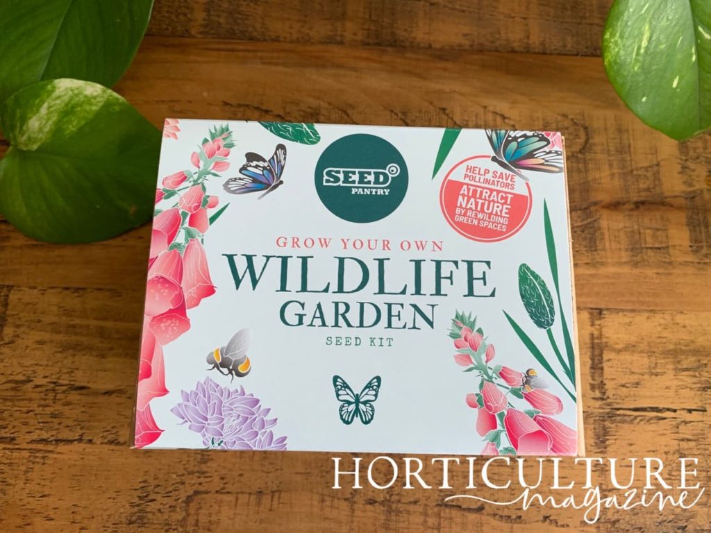 wildlife garden seed kit box with a floral and insect themed design on the front