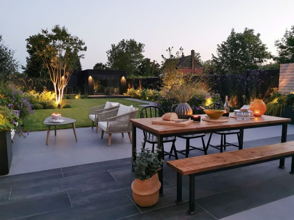 zen garden designed by Georgia with paving and an outdoor seating area