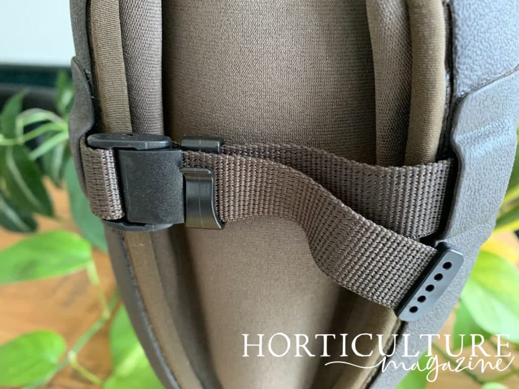 the adjustable strap at the top of a pair of Muck Boots