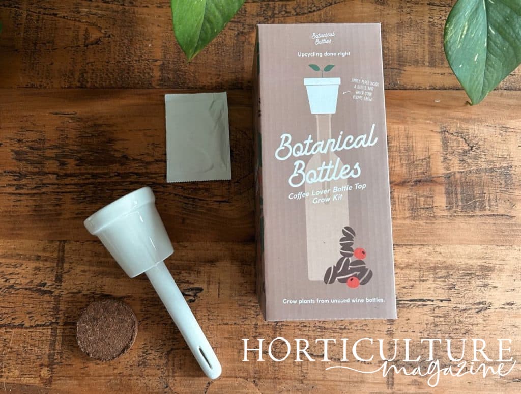 the contents of the botanical bottles growing kit on a wooden table