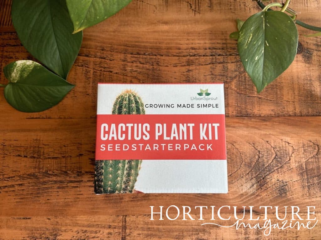 the cactus plant kit box from urban sprout with red and white colouring on the packaging