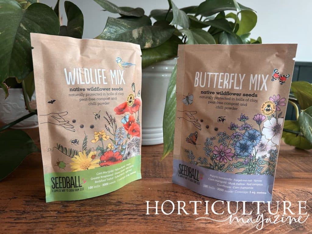 two grab bags from Seedball containing 100 seed balls in each