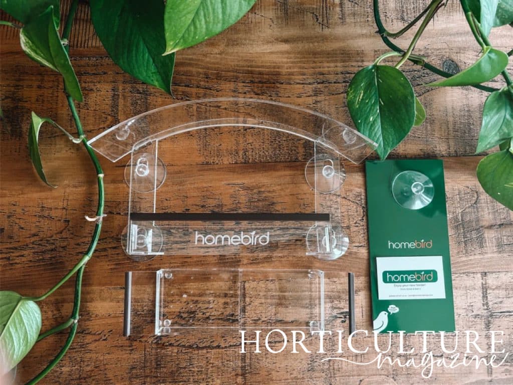 homebird window box feeder made of durable clear plastic