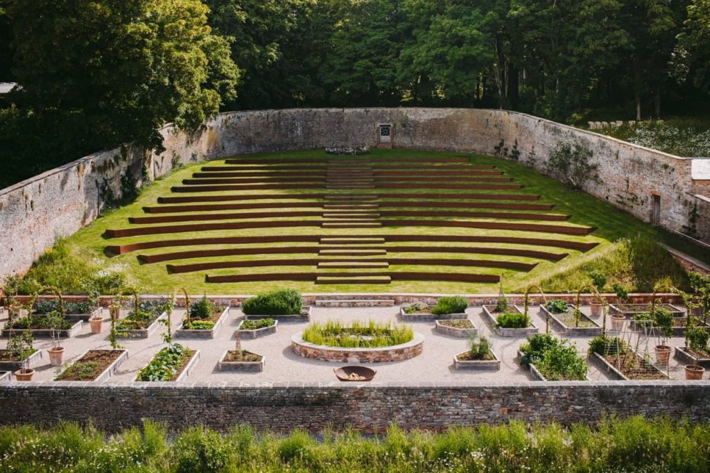 the Belmont estate with raised beds and a grassy levelled seating area