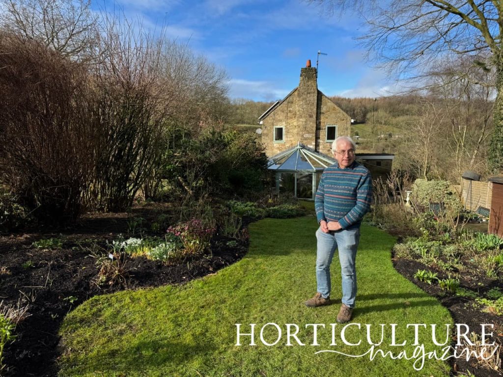 David Moreton stood on the lawn at Chevin Brae in front of his house