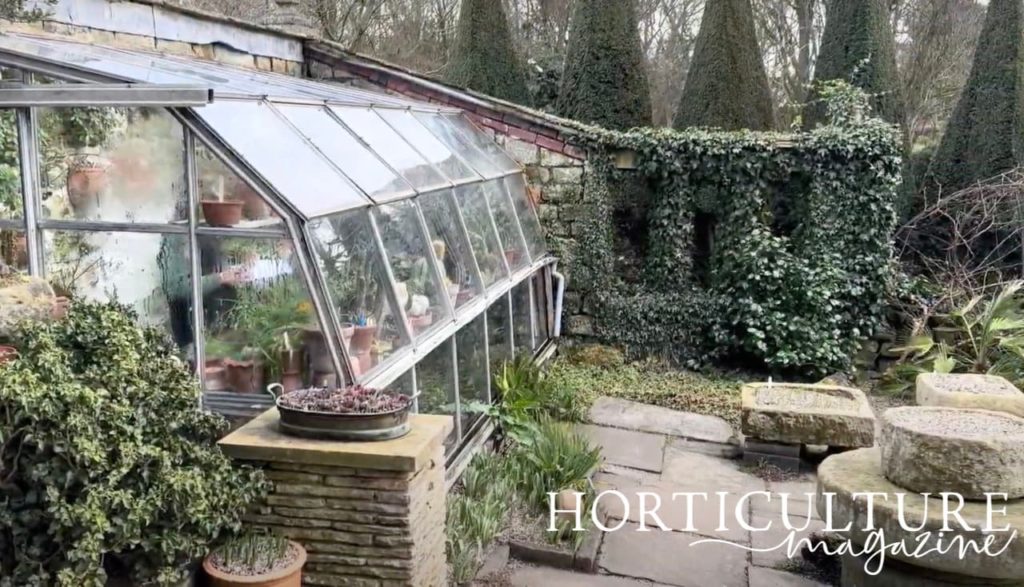 the greenhouse in the paved garden at York Gate