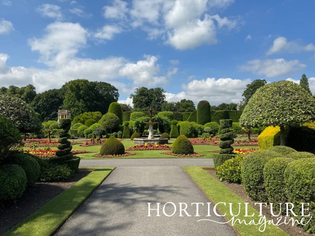 the Victorian flower garden at Brodsworth with lots of topiary pieces and colourful bedding plants