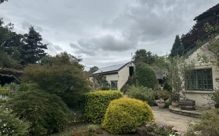 the house at Rowley house surrounded by herbaceous plantings and shrubs